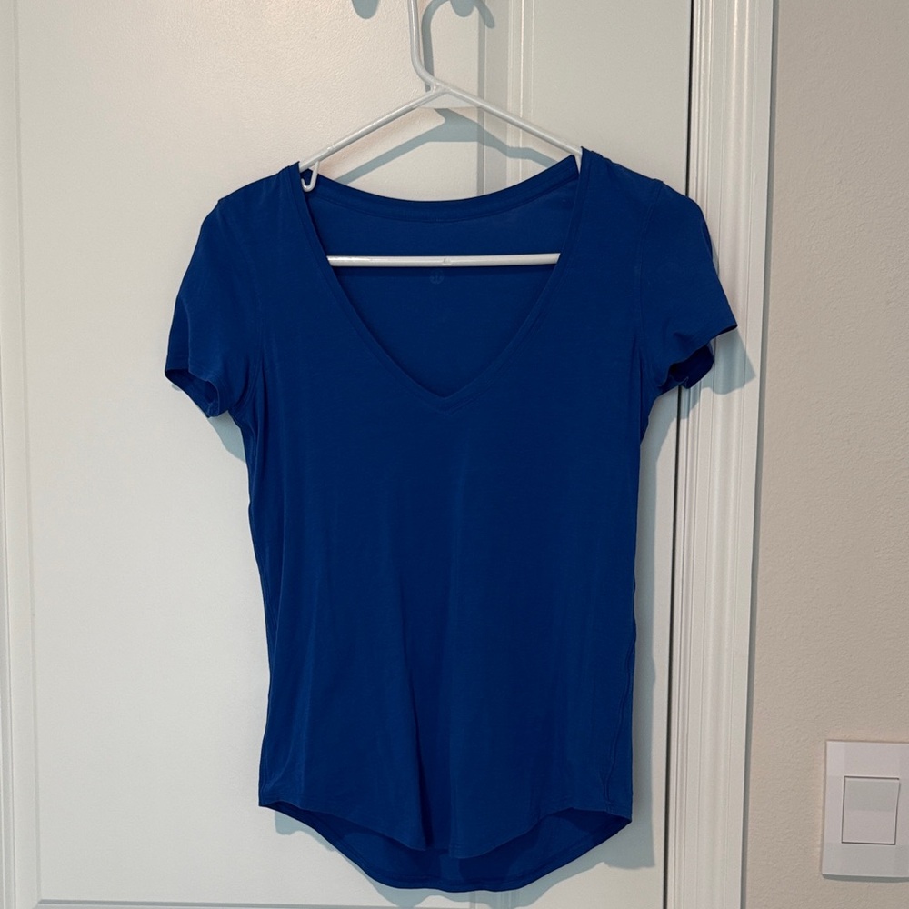 Lulu lemon love v neck cap sleeve tee. Blue size 4. New. Washed, not worn.